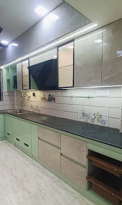 Straight-Line Modular Kitchen – Pastel Green & Marble Finish Modular Kitchen Desk and Decor 