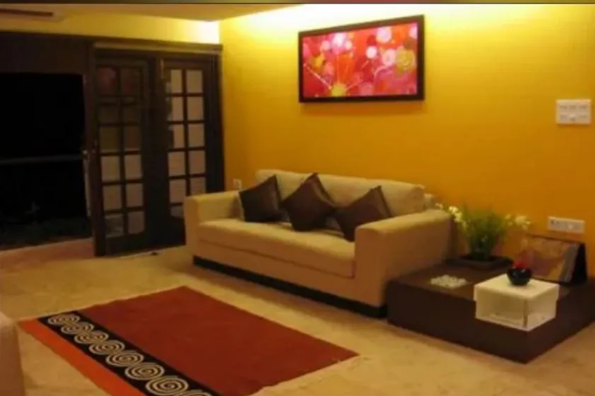 Living Room with Bold Yellow Accent Wall Modern Living Room Designs Desk and Decor 