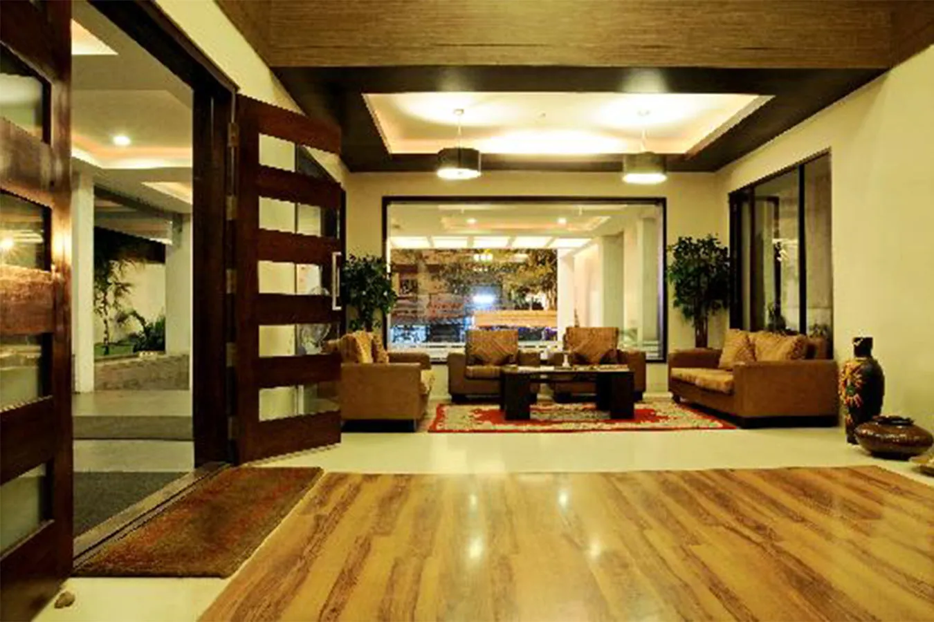 Living Room with Carved Wooden Entrance Frame Wooden Carving Style Interiors Desk and Decor 