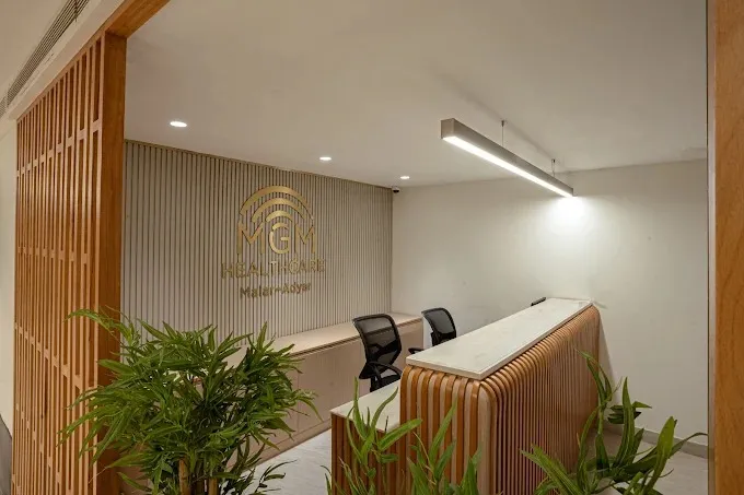 Hospital Waiting/Reception Lounge with Symmetrical Seating Healthcare Interior Design Desk and Decor 