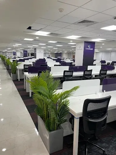 Large Corporate Open Office with Purple-Accent Workstations Corporate Office Layouts Desk and Decor 