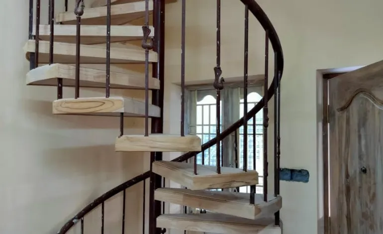Spiral Staircase with Wooden Treads & Metal Railing (Under Construction) Modern Staircase Desk and Decor 