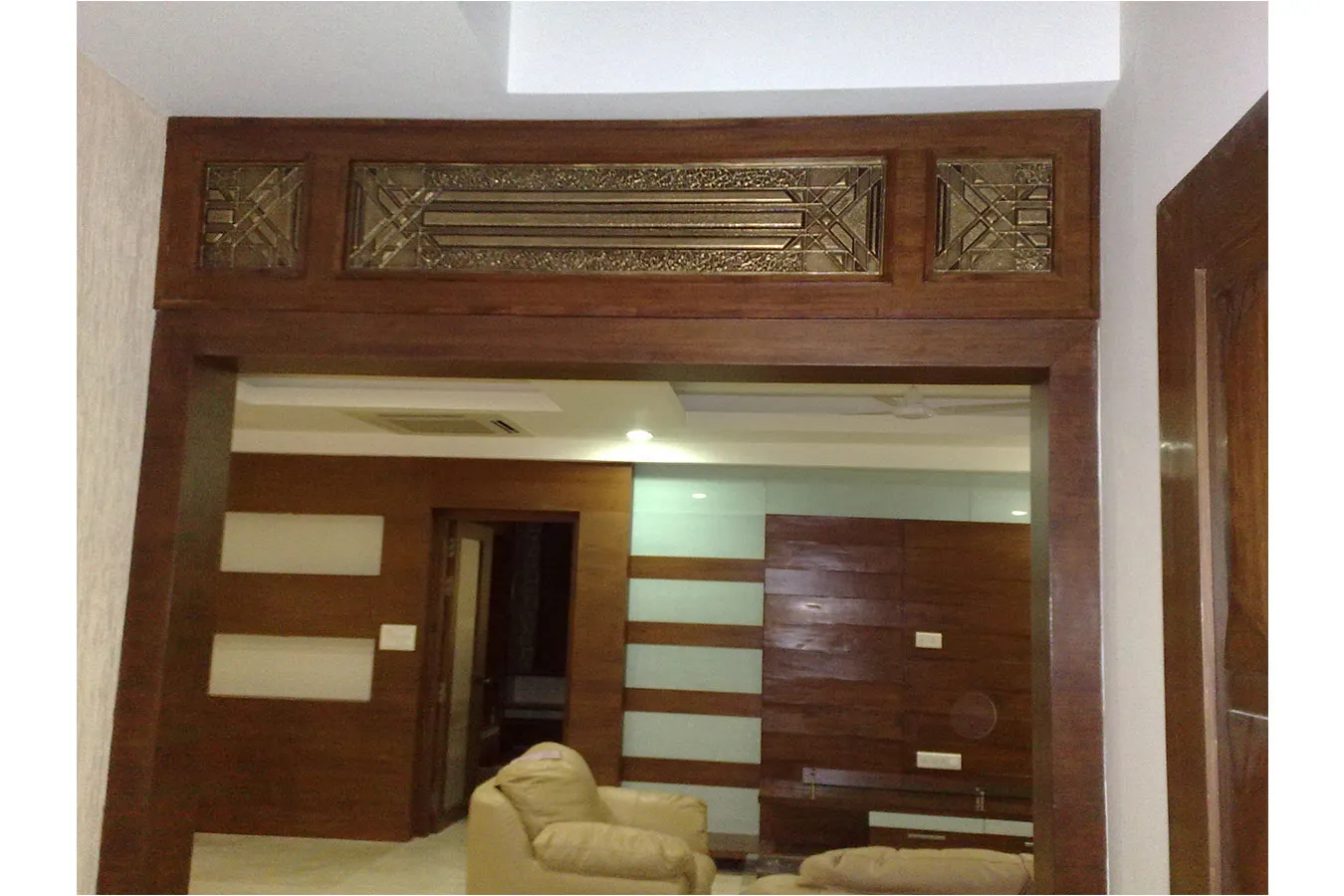 Living Room with Carved Wooden Entrance Frame Wooden Carving Style Interiors Desk and Decor 