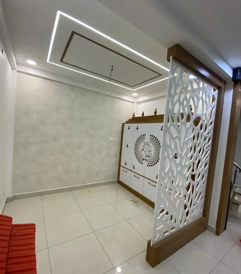 White Jaali-Cut Pooja Unit with Decorative Partition Screen Dedicated Pooja Room Desk and Decor 