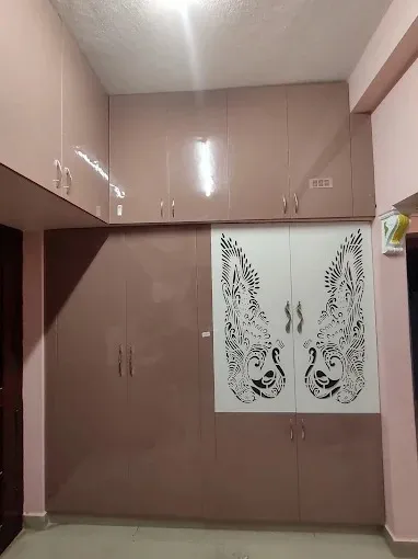 Custom Floor-to-Ceiling Wardrobe with CNC Jali Design Modular Wardrobe Desk and Decor 
