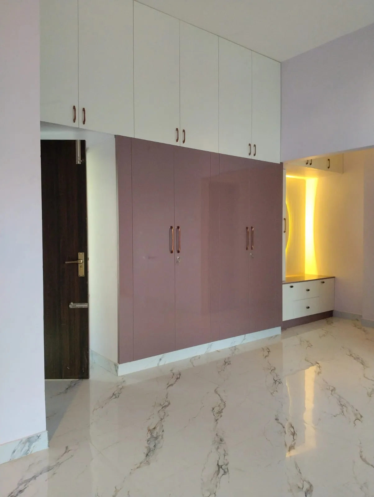 Unified Elegance Full-Height Wardrobe with Over-Door Loft and Integrated Vanity Hinged Wardrobes Desk and Decor 