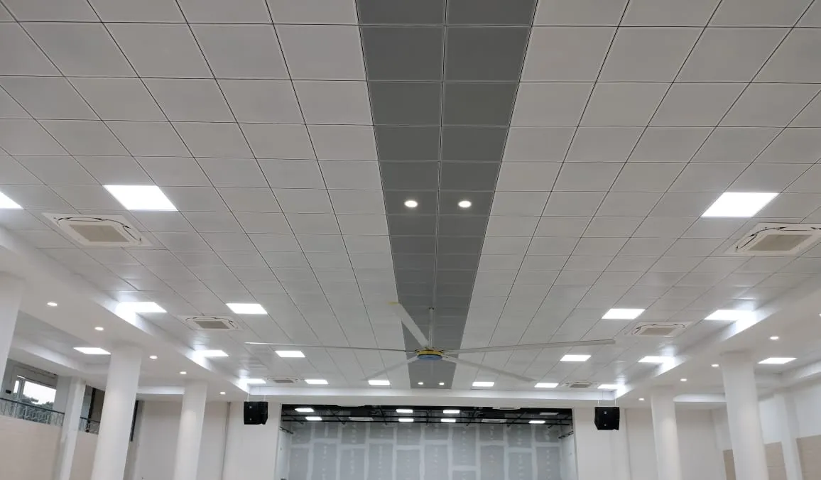 Wood-Finish Grid False Ceiling with Integrated Services – Corridor Architectural False Ceiling & Lighting Desk and Decor 