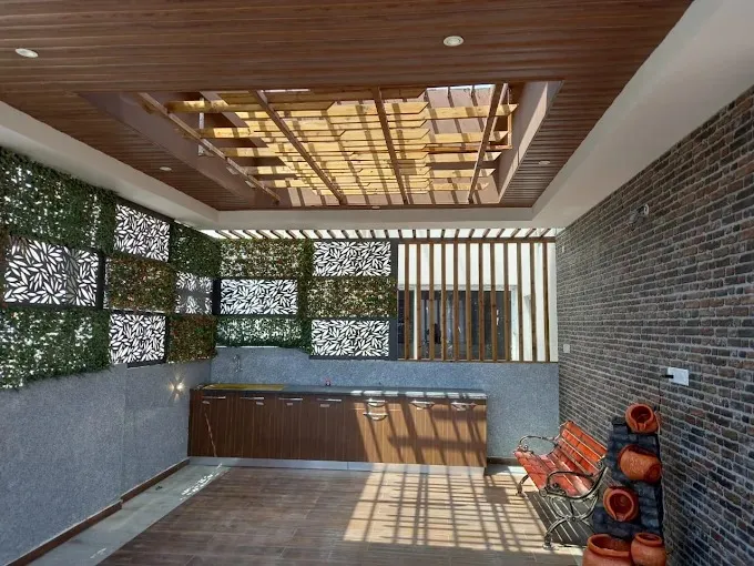 covered outdoor sit-out / semi-open patio corridor Courtyard Spaces Desk and Decor 