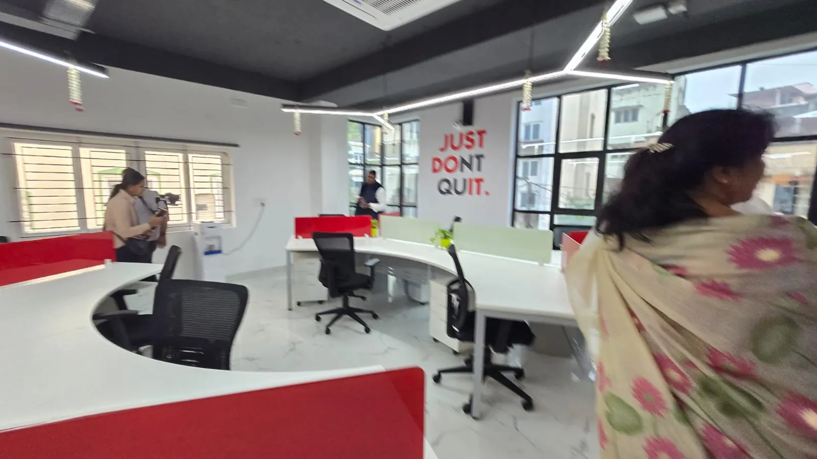 Curved Ergonomic Workstations with Inspirational Branding"  Desk and Decor 