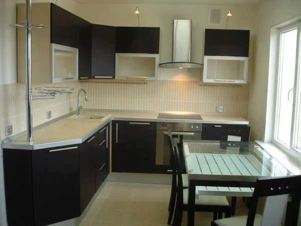 L-Shaped Modular Kitchen with Black Cabinets & Dining Nook with Modular Kitchen at Deskanddecor