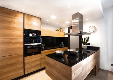 Modern Wooden Modular Kitchen with Black Countertop & Island with Modular Kitchen at Deskanddecor