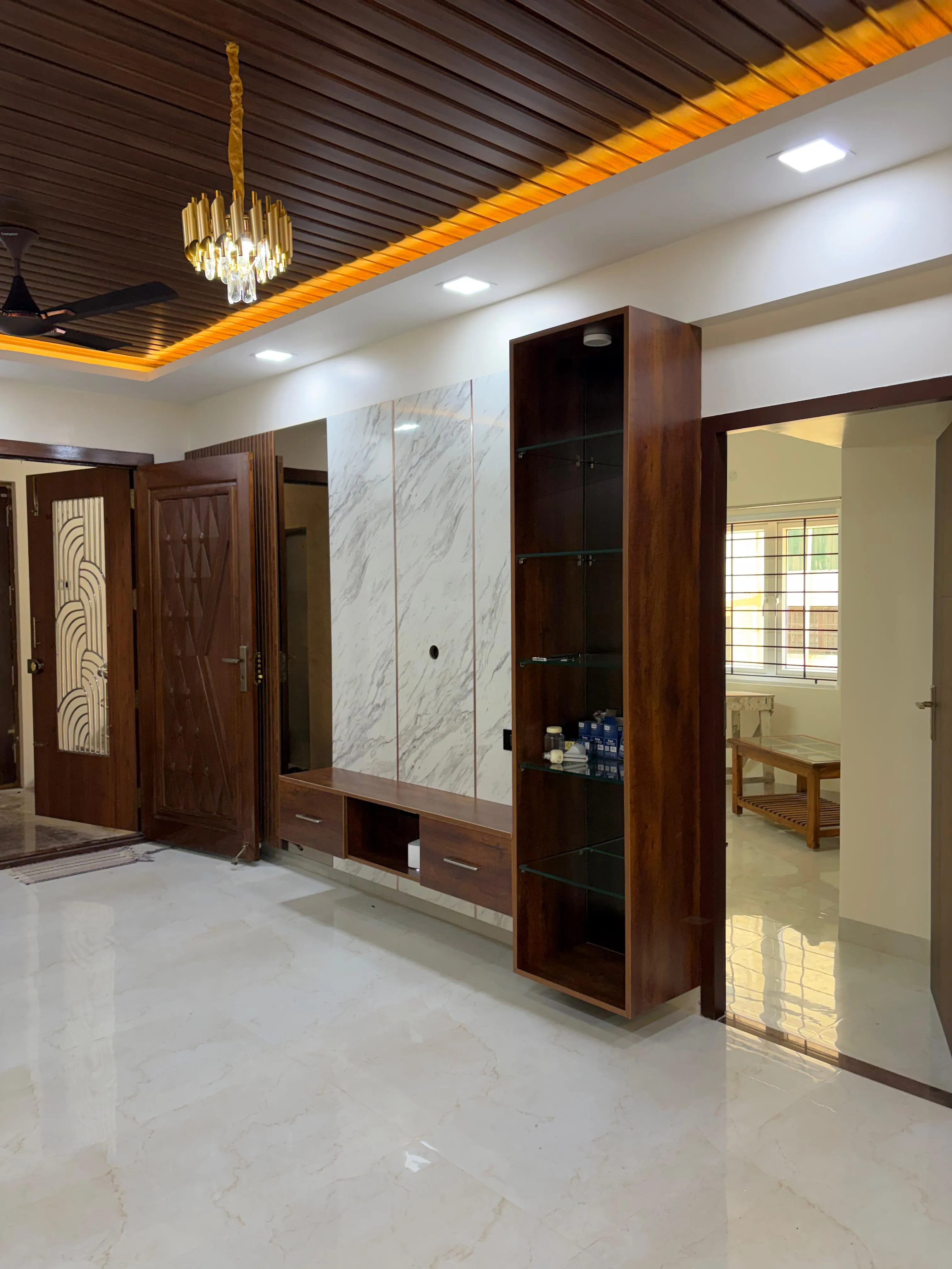 Modern Contrast Floating Marble Media Unit with Walnut Display Tower with Wall Mounted TV Units at Deskanddecor