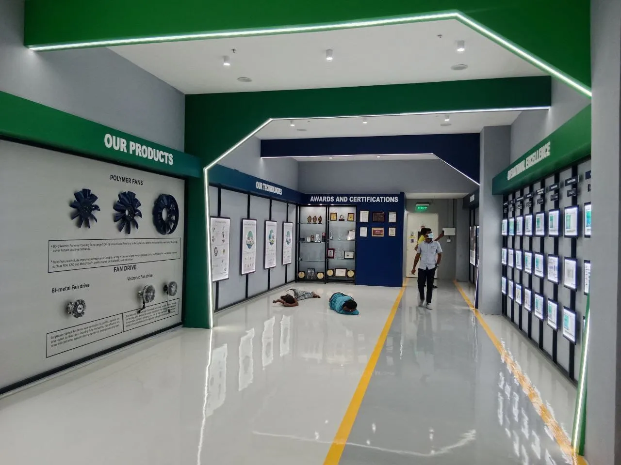 Industrial Product Display Gallery with Integrated 'Our Products' and 'Awards' Zoning with Feature Display Units at Deskanddecor