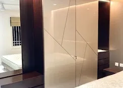 Bedroom with High-Gloss Geometric Wardrobe with Modular Wardrobe at Deskanddecor