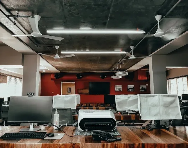 Industrial-Style Open Office Workspace with Open Workspace Offices at Deskanddecor