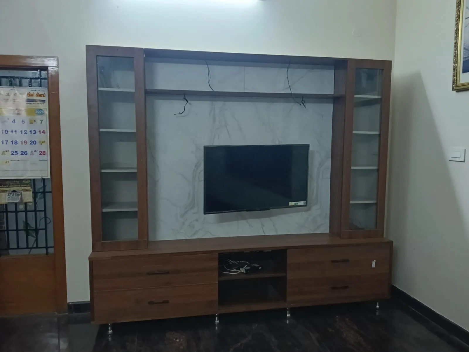 Modern  wallmounted wooden entertainment unit a marble finish panel and walnut Accents with Wall Mounted TV Units at Deskanddecor