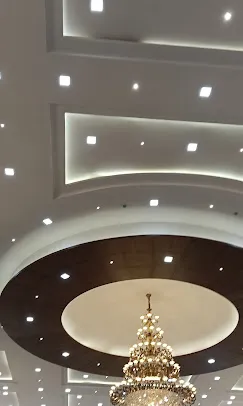Multi-Tier Circular False Ceiling with Crystal Chandelier with Architectural False Ceiling & Lighting at Deskanddecor