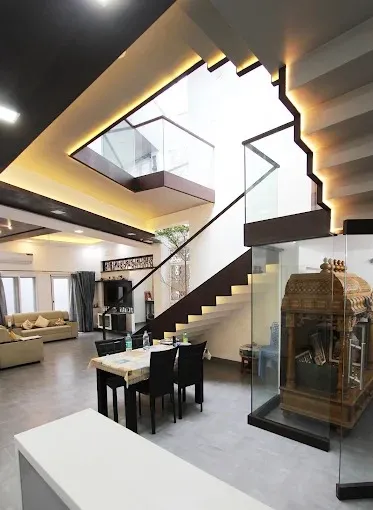 Living Room, Dining Area & Staircase — Open Plan Foyer with Modern Living Room Designs at Deskanddecor