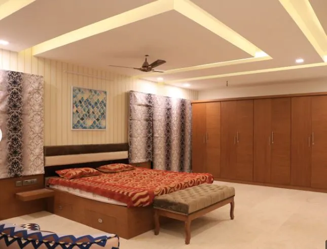 Master Bedroom with Wardrobe & Geometric Ceiling with Modern Bedroom at Deskanddecor