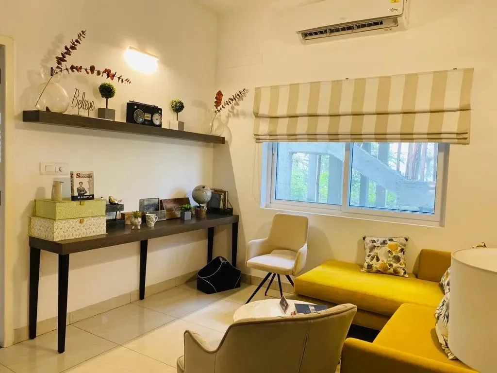 Living Room with Study Console & Yellow Settee with Modern Living Room Designs at Deskanddecor