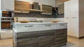 Modern Kitchen with Wood-Grain Island and Wall-Mounted Cabinets with Modular Kitchen at Deskanddecor