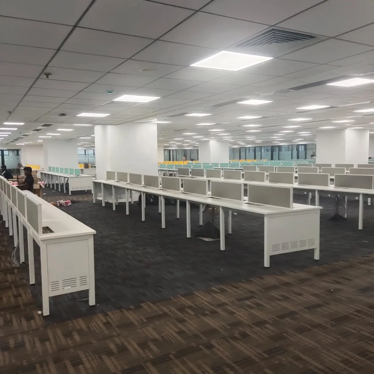 Integrated Branding, Ergonomic Workstations, and Technical Showrooms with Open Workspace Offices at Deskanddecor