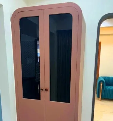 Bedroom with Curved-Top Terracotta Wardrobe with Modular Wardrobe at Deskanddecor