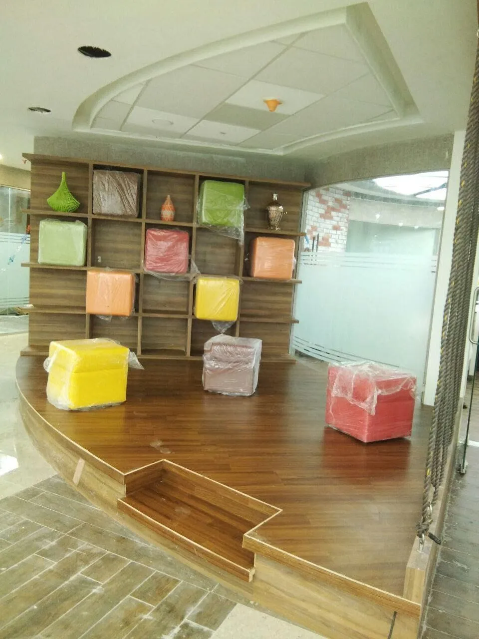 Industrial Showroom Gallery with Modern Reception and Technical Component Display with Corporate Office Layouts at Deskanddecor