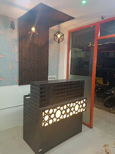 Modern Reception Counter with Decorative Back Panel with Reception Area Design at Deskanddecor