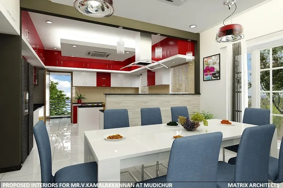 Open-Plan Dining Area with Bold Red Modular Kitchen Backdrop with Open Dining with Living at Deskanddecor