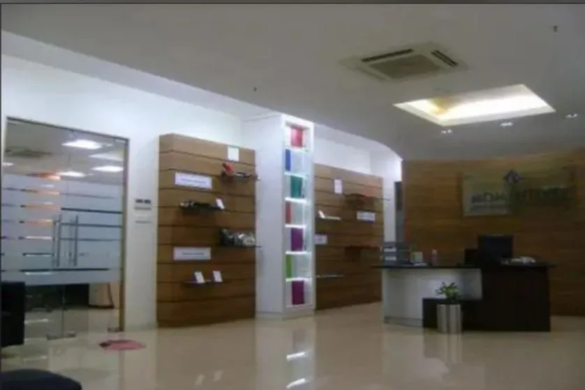Reception with Product Display Wall with Reception Area Design at Deskanddecor