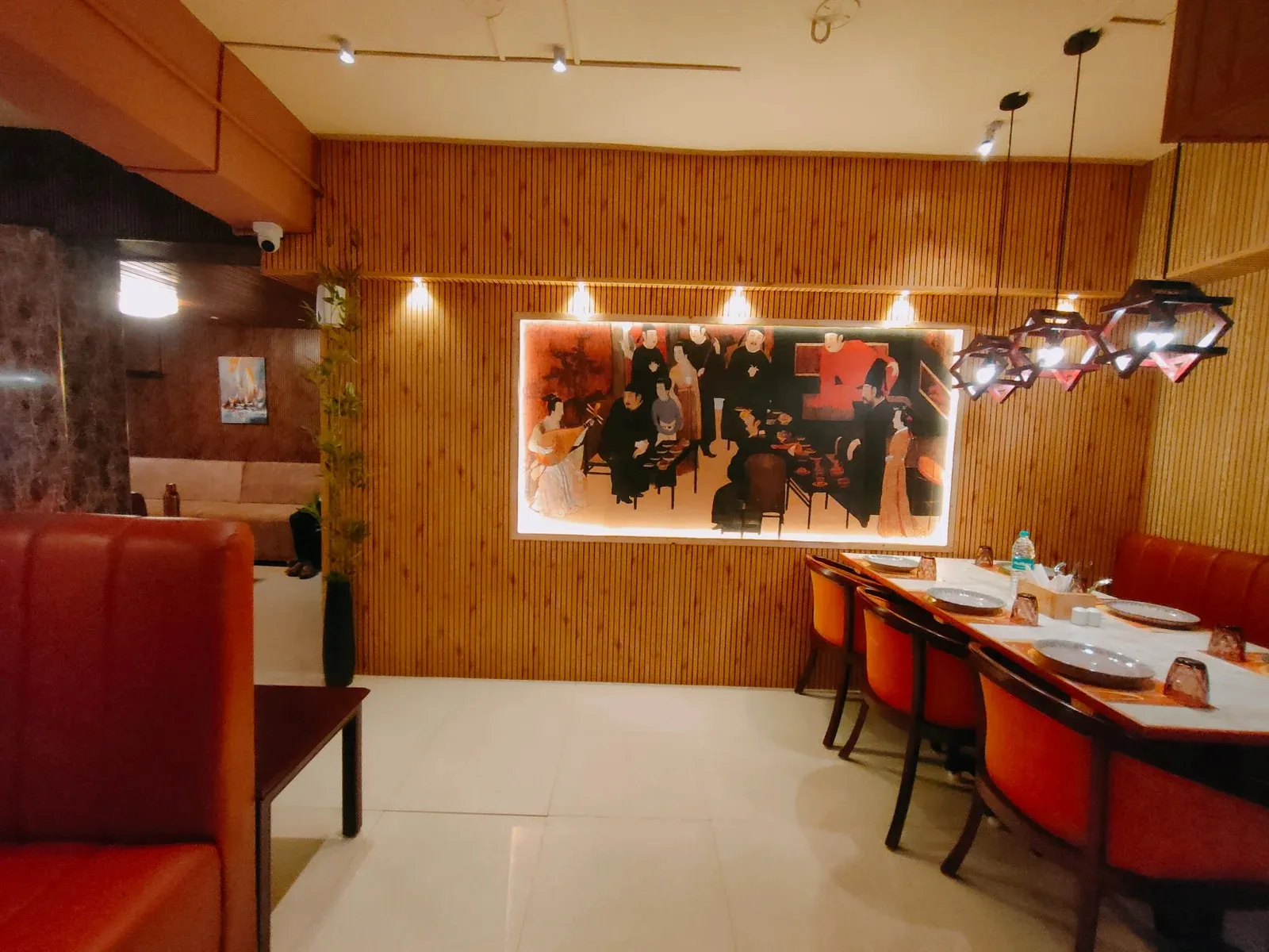 Oriental-Themed Restaurant Interior with Wooden Slat Wall & Booth Seating with Luxury Hotel Lobby Design at Deskanddecor