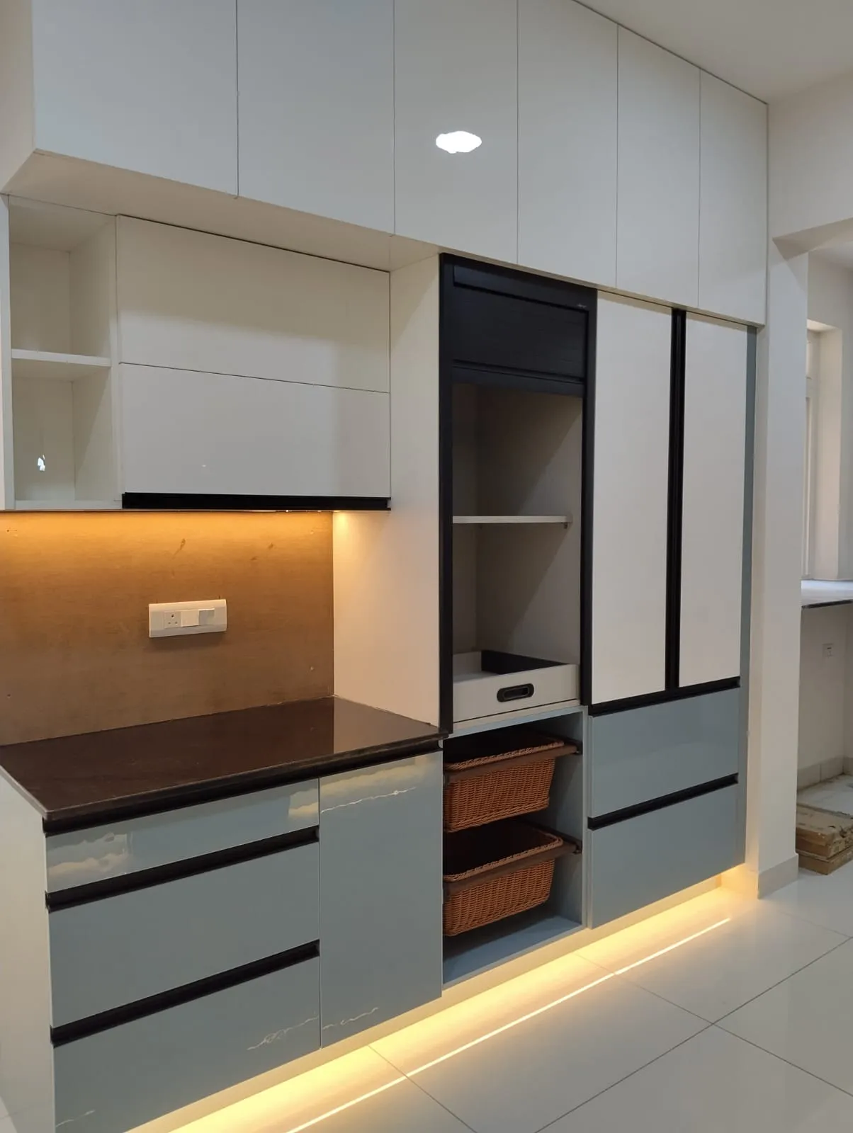 Modern Functional Kitchen Tall Pantry Unit with Integrated Roller Shutter and Ambient Under-Cabinet Lighting with Pantry Units at Deskanddecor