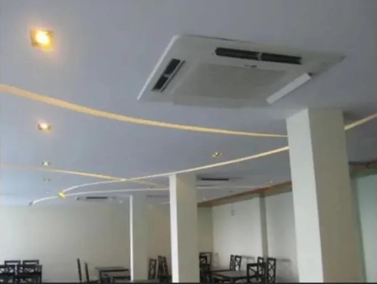 Commercial Restaurant Dining Hall with Wavy Ceiling Lights with Fine Dining Restaurant at Deskanddecor