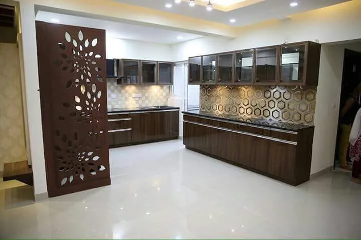 Hall Cum  Kitchen with Base Cabinets at Deskanddecor